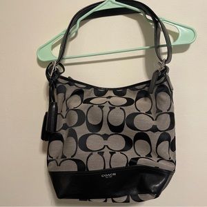 Coach black signature C Purse NWOT.

Includes coin purse